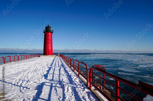 lighthouse on a lake in winter