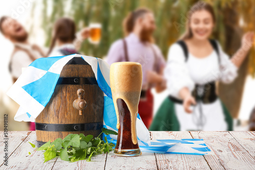 Wooden barrel and glass of ...