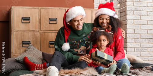 Happy African-American fami...