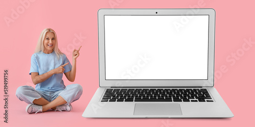 Mature woman and big laptop...