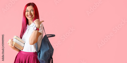 Young female student with b...