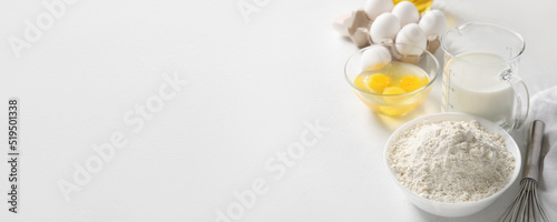Fényképezés Different ingredients for baking on white background with space for text