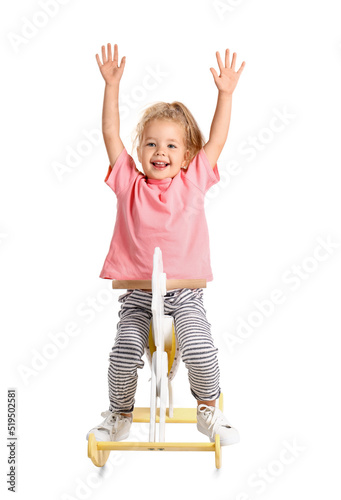 Cute little girl with rocki...