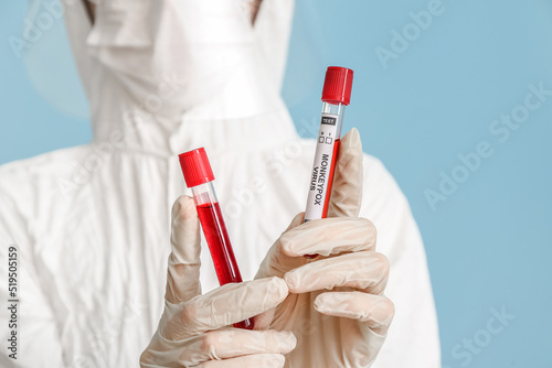 Scientist with samples of m...