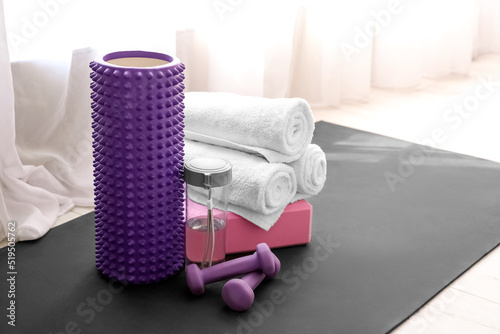 Foam roller, bottle of wate...
