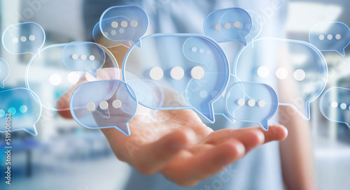 Foto Businessman using digital speech bubbles talk icons