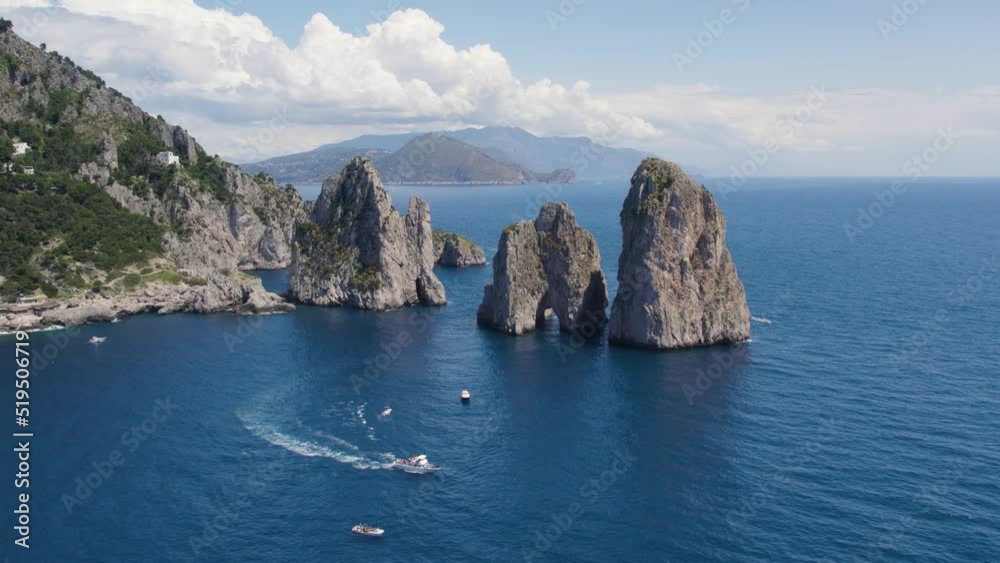 Faraglioni Sea Stack Natural Rock Formations on Capri Coast, Aerial Faraglioni Sea Stack Natural Rock Formations on Capri Coast, Aerial