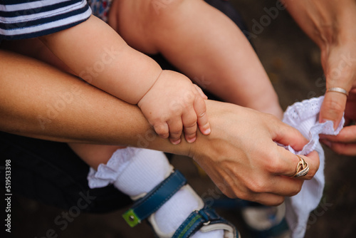 arms and legs of the baby on the background of dreams