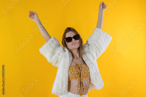 Enthusiastic happy and joyful young girl in glasses. Concept of omg discounts, sale, gifts.