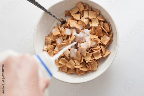 Fotografija Pouring Milk Over Cinnamon Toast Crunch Cereal