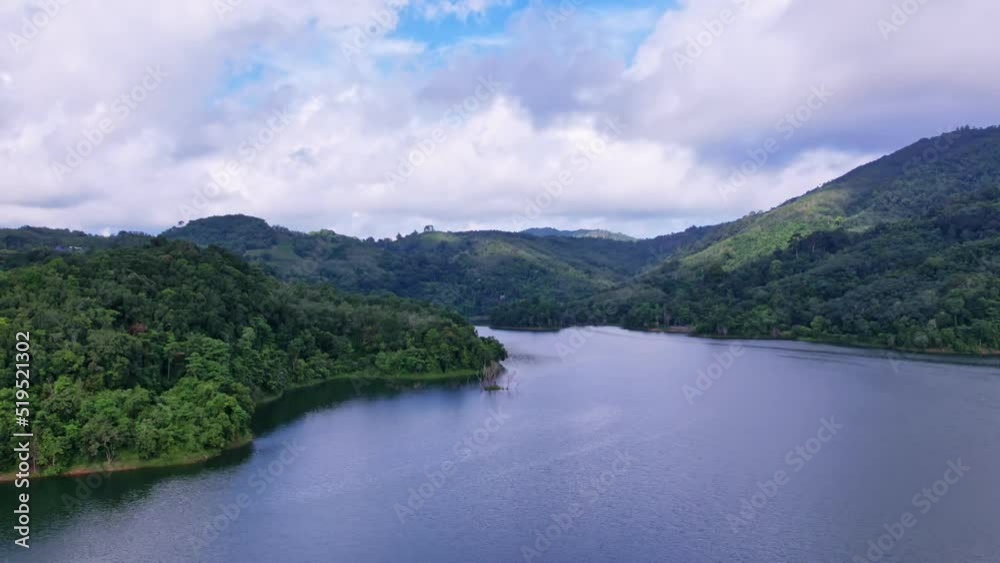 Aerial view Drone Hyperlapse shot of Tropical landscape rainforest with clouds flowing over mountain in phuket Thailand.Nature environment concept Aerial view Drone Hyperlapse shot of Tropical landscape rainforest with clouds flowing over mountain in phuket Thailand.Nature environment concept