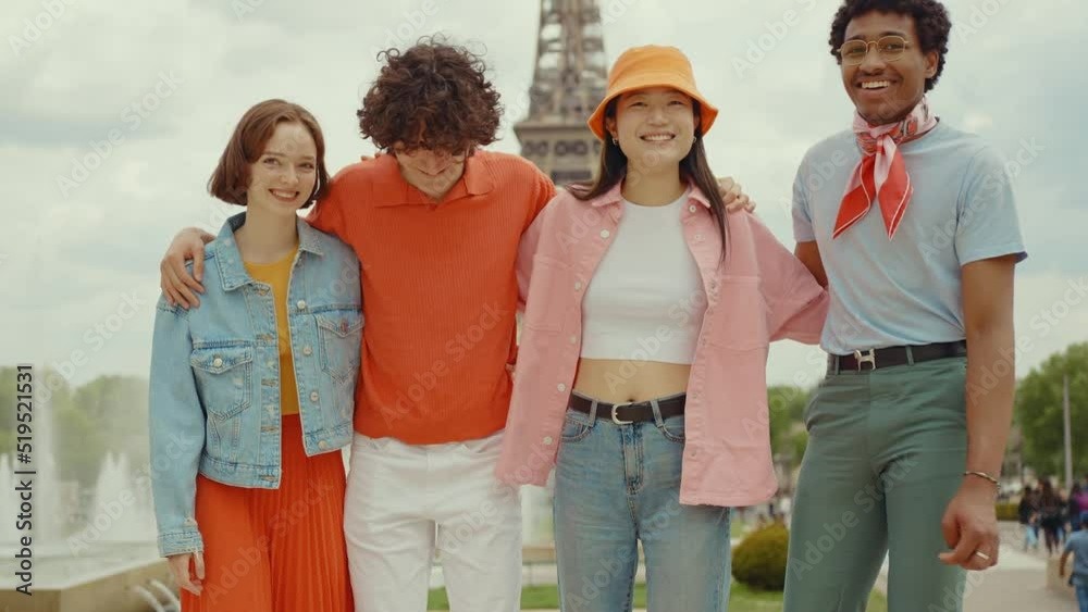 Video of an happy group of millennial teenagers spending time in Paris around the eiffel tower area Video of an happy group of millennial teenagers spending time in Paris around the eiffel tower area