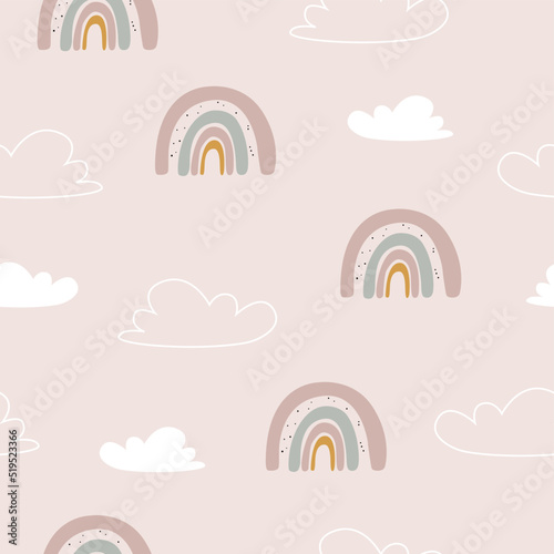 Seamless pattern with rainbow and white clouds. For wallpaper, fabric, children's clothing, gift wrapping and paper. Hand drawn vector.