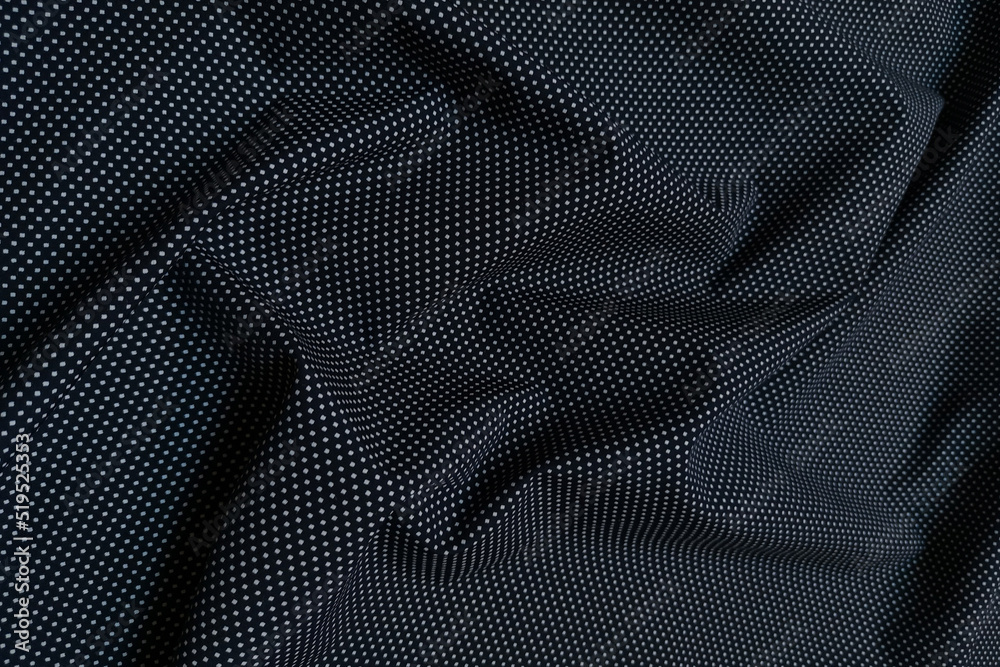 Dark blue fabric with white dots. Crumpled or wavy fabric texture background. Abstract linen cloth soft waves. Natural yarn. Smooth elegant luxury cloth texture. Concept for banner or advertisement. Dark blue fabric with white dots. Crumpled or wavy fabric texture background. Abstract linen cloth soft waves. Natural yarn. Smooth elegant luxury cloth texture. Concept for banner or advertisement.