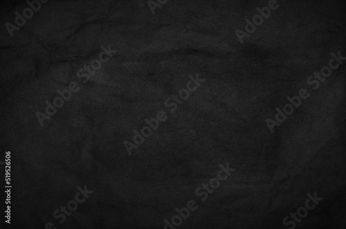 Crumpled black paper for background image