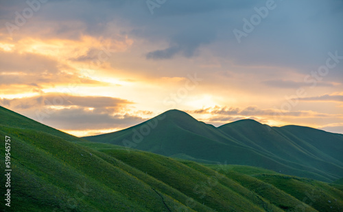 sunrise in mountains in foggy morning