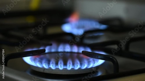 Close up of two gas burners, focusing from one to another photo