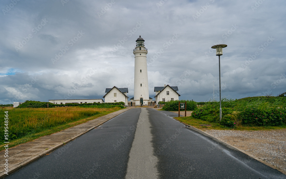 White Lighthouse in the sand and grass dunes, Hirtshals Fyr in Hirtshals, North Jutland in Denmark, Europe