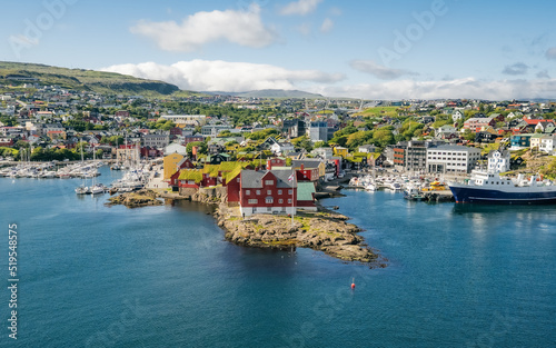 View from ferry on Torshavn harbor and Tinganes, the historic location of the Faroese government in Torshavn, the Faroe Islands. photo