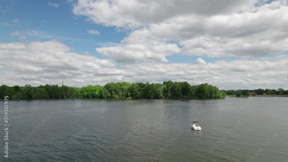Panaroma shot of a boat standing still in a lake with green trees on the lake side, 360 view Panaroma shot of a boat standing still in a lake with green trees on the lake side, 360 view