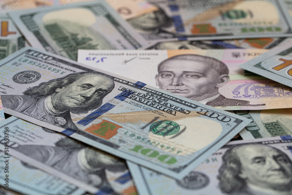 100 dollar and 500 hryvnyas banknotes background 100 dollar and 500 hryvnyas banknotes background