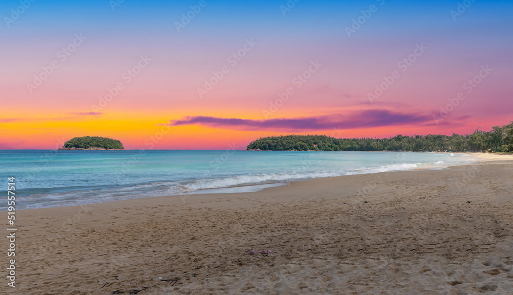 Colourful Skies Sunset over Kata Beach in Phuket Thailand. This Lovely island waters are turquoise blue waters, lush green mountains colourful skies and beautiful views of Pa Tong Patong