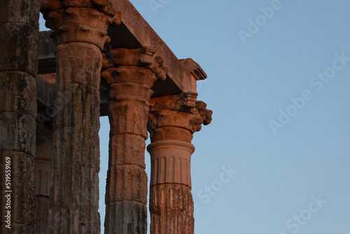 Detail of the capitals and columns of the Temple of Diana at sunset, a Roman temple built in the 1st century AD in the city of Augusta Emerita, capital of the Roman province of Lusitania, now Merida photo