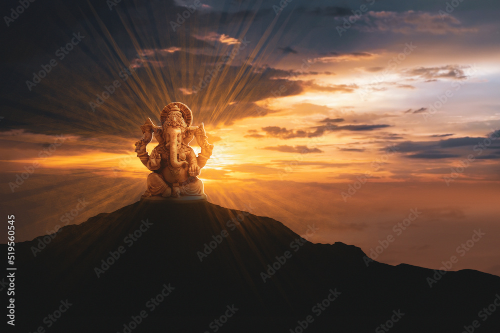 Lord ganesha sculpture on sun light background. - obrazy, fototapety, plakaty 