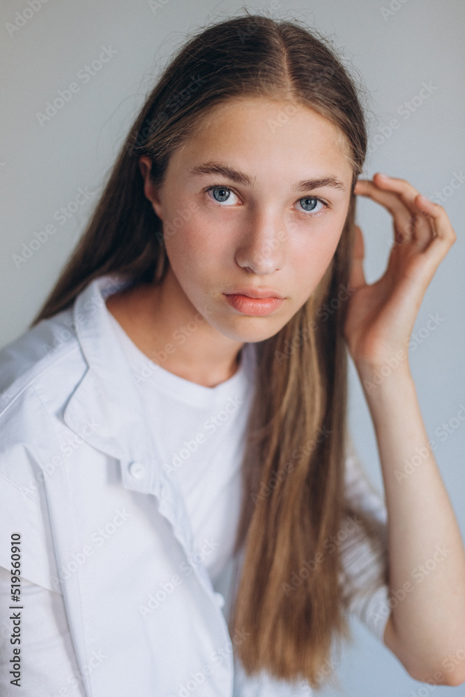 Young blondie caucasian girl on white background. Natural beauty, no make up, casual lifestyle girl Young blondie caucasian girl on white background. Natural beauty, no make up, casual lifestyle girl