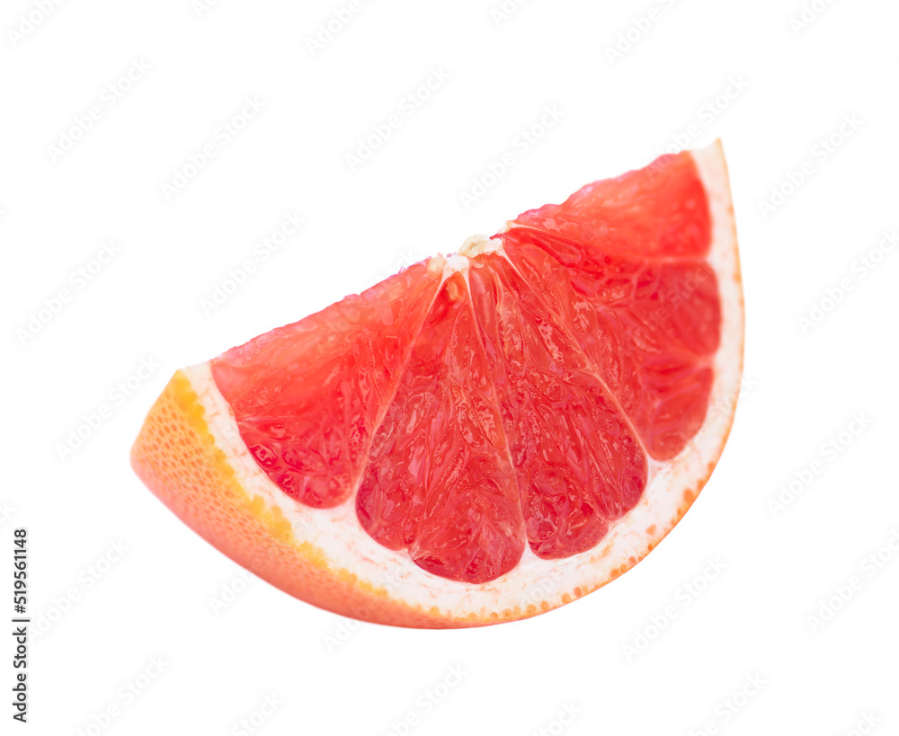 A piece of grapefruit close-up isolated on a white background. A piece of grapefruit close-up isolated on a white background.