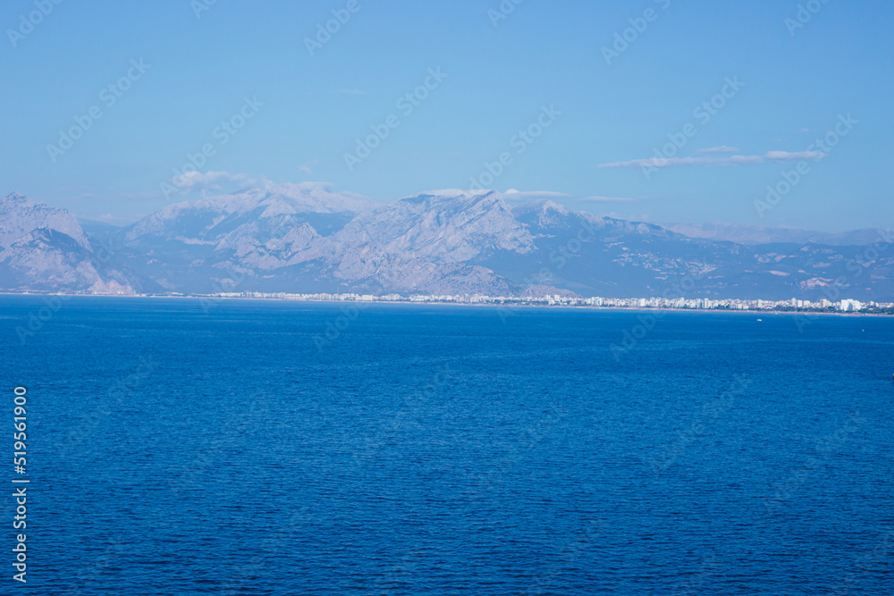 Top view of blue frothy sea surface. Shot in the open sea from above. Top view of blue frothy sea surface. Shot in the open sea from above.