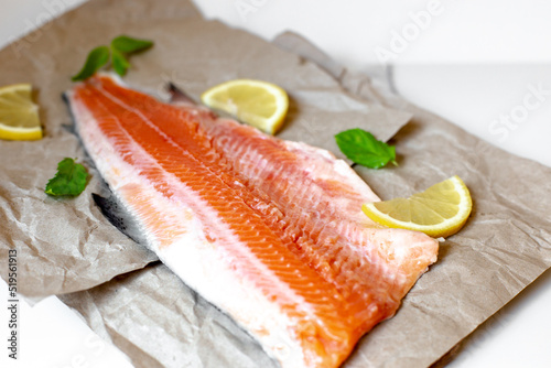fresh raw salmon on cooking paper