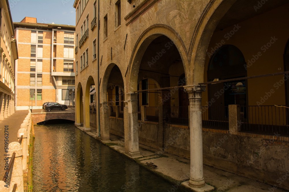 A small canal running through the historic centre of Treviso in Veneto, north east Italy

