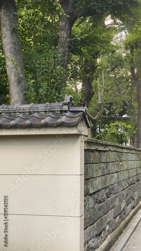 Street corner of old Japanese temple exterior, at Todai-mae downtown cityscape, July 27th, 2022 Tokyo Japan
