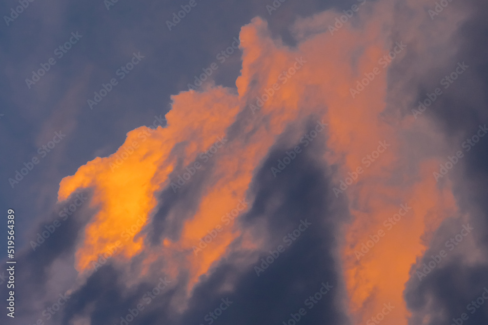 Beautiful cloudy evening blue sky orange colorful sunset change weather natural background