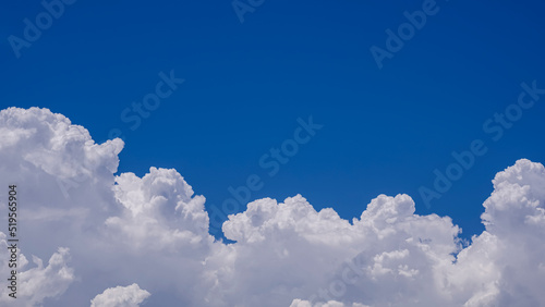 Photography Beautiful summer blue sky background with white cumulonimbus clouds in sunny day