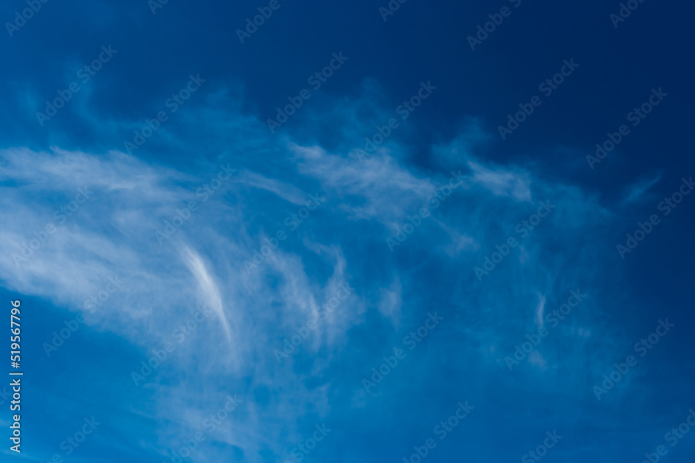 Dark blue sky atmosphere with white air clouds weather wind nature background