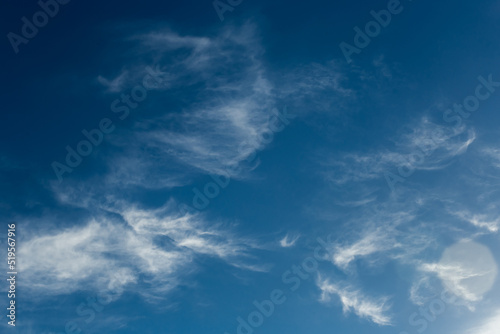 Fototapeta Naklejka Na Ścianę i Meble -  Dark blue sky atmosphere with white air clouds weather wind nature background