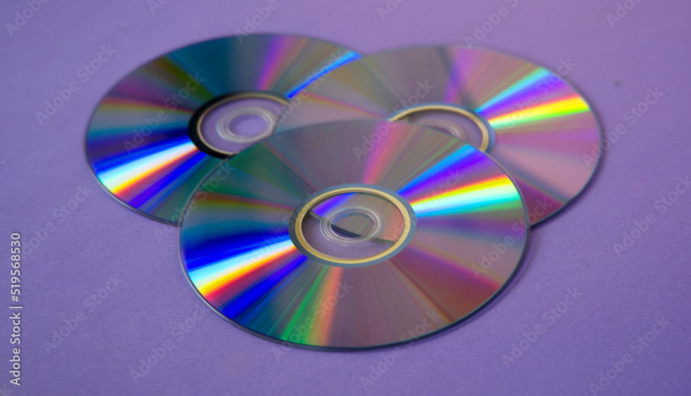 background of some colorful compact discs background of some colorful compact discs