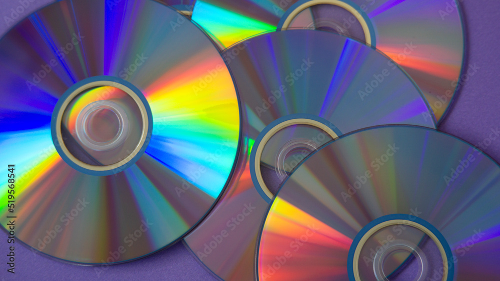 background of some colorful compact discs background of some colorful compact discs
