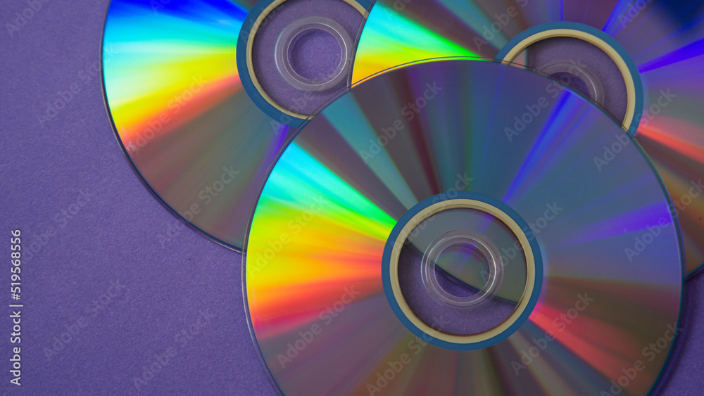 background of some colorful compact discs background of some colorful compact discs