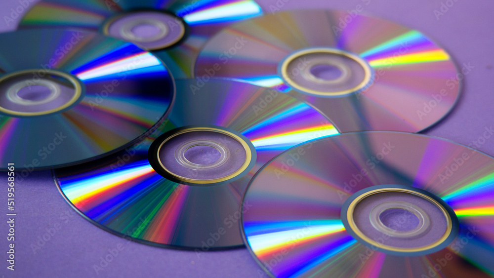 background of some colorful compact discs background of some colorful compact discs
