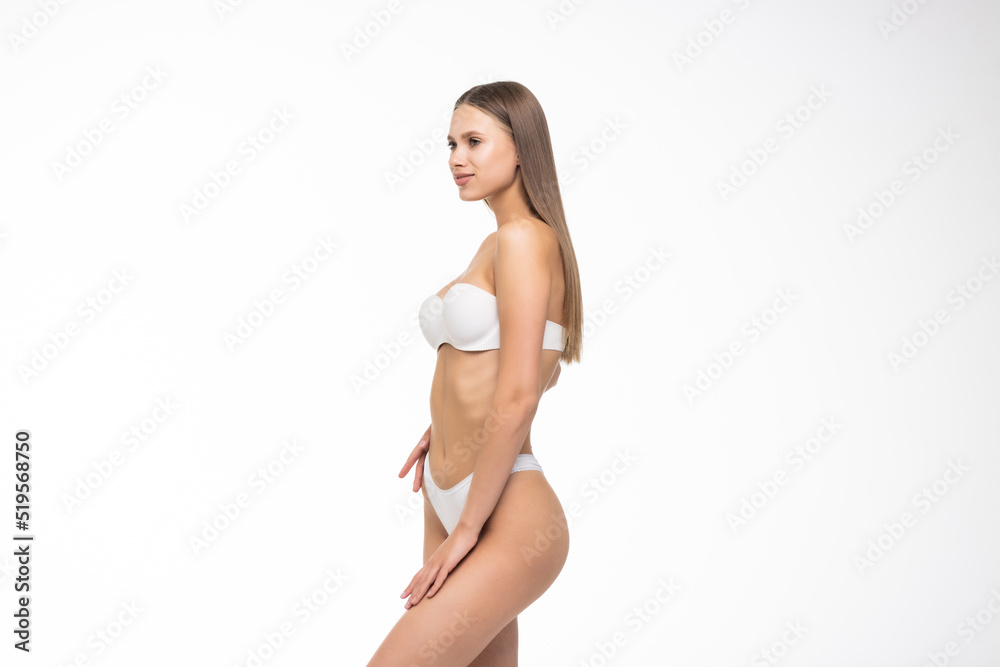 Young Woman body in perfect form, cosmetic cellulite treatment, plastic surgery and liposuction. Young Woman body in perfect form, cosmetic cellulite treatment, plastic surgery and liposuction.