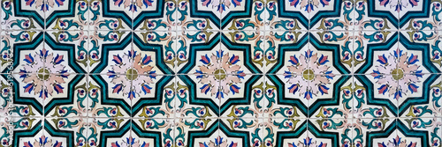 Azulejos in Portugal, detail on a typical house, colorful background