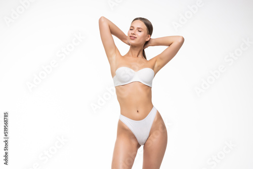Young Woman body in perfect form, cosmetic cellulite treatment, plastic surgery and liposuction.