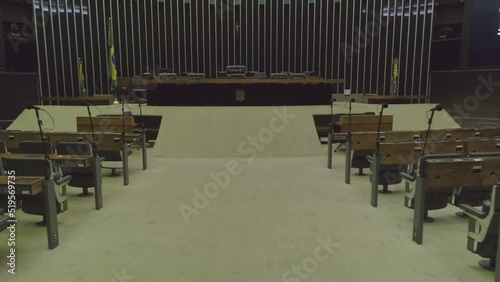 Low angle forward moving shot down the central aisle of the Lower House of the Chamber of Deputies in the Brazilian Congress, Brasilia photo