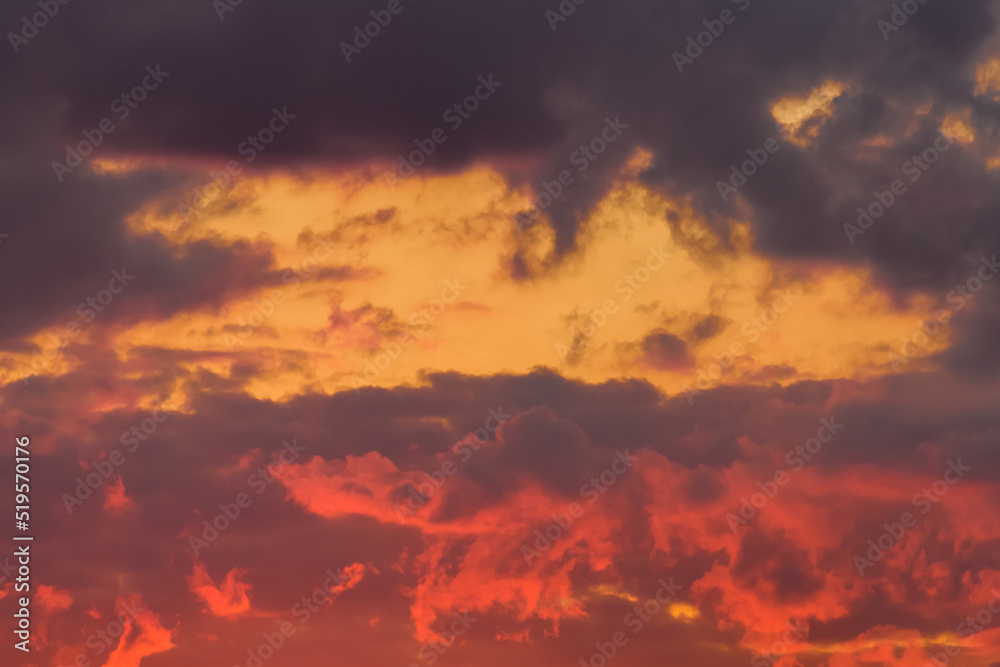 Bright red-orange sunset sky clouds summer background nature evening
