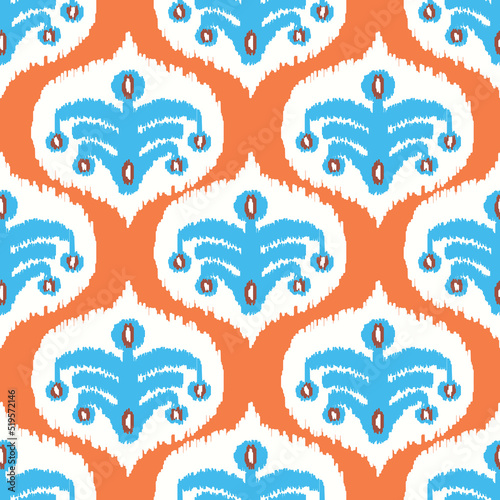Orange color digital ikat pattern for creating beautiful fabrics design and other elements of the fashion industry and home interior. Adras or atlas - traditional Uzbek ornament, produced in Margilan