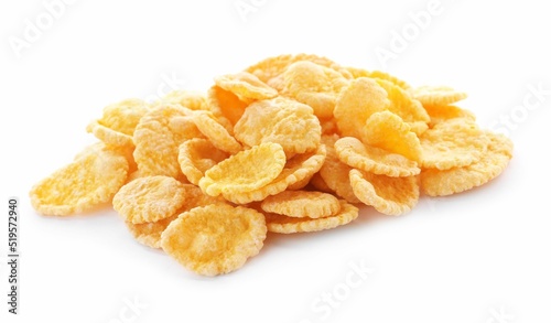 Pile of tasty corn flakes on white background