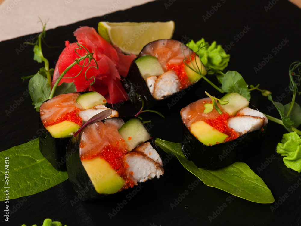 sushi rolls without rice with salmon, eel, avocado and cucumber
